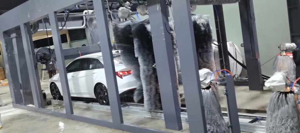 How Mattias Tunnel Car Wash Machines Reduce Labor Costs by 70% and Boost Profitability 2 Busy Tunnel Car Wash at Night